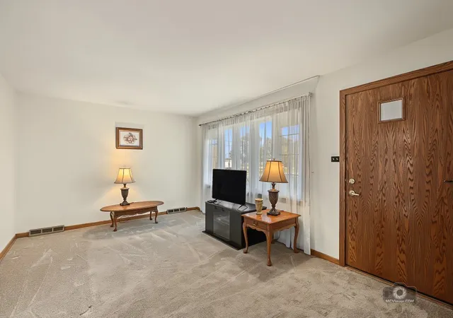 Photo 2 of Single family home for sale at 5104 S Menard Ave, Chicago, IL 60638 | MLS# 12770906 | Listing updated on 2026-10-07