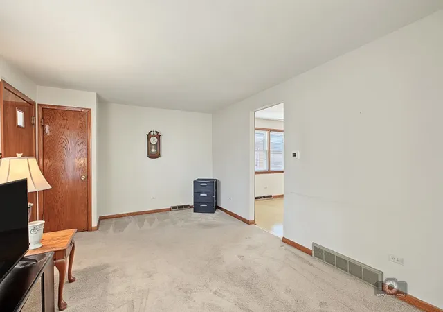 Photo 3 of Single family home for sale at 5104 S Menard Ave, Chicago, IL 60638 | MLS# 12770906 | Listing updated on 2026-10-07