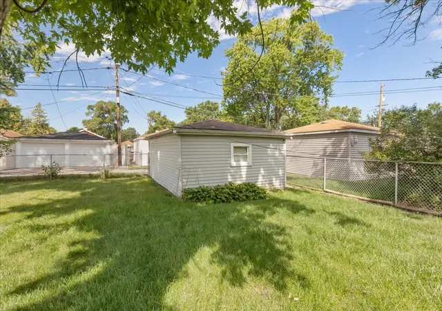 Photo 3 of Single family home for sale at 14836 S Langley Blvd, Dolton, IL 60419 | MLS# 12770931 | Listing updated on 2026-10-04