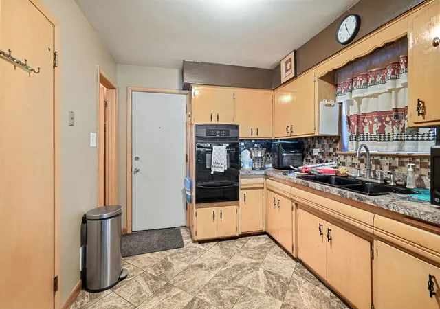Photo 3 of Single family home for sale at 14220 Kimbark Ave, Dolton, IL 60419 | MLS# 12771111 | Listing updated on 2026-10-07