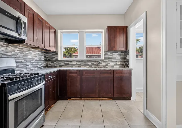Photo 4 of Multi family home for sale at 7700 S Laflin St, Chicago, IL 60620 | MLS# 12771558 | Listing updated on 2026-10-06
