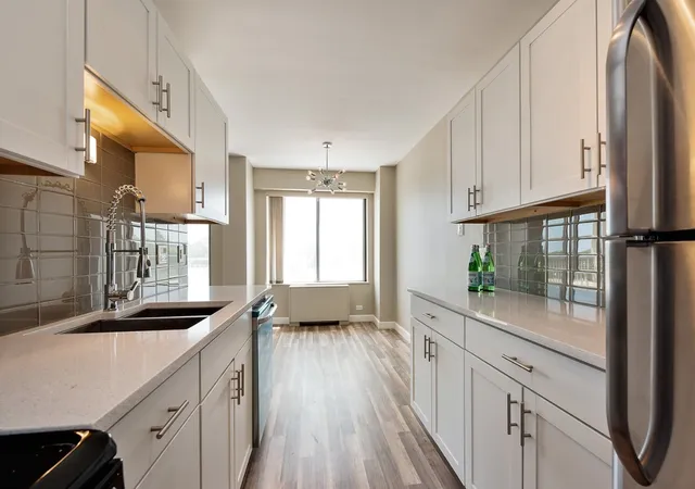 Photo 3 of Condo for sale at 7061 N Kedzie Ave #305, Chicago, IL 60645 | MLS# 12772626 | Listing updated on 2026-10-18