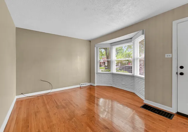 Photo 3 of Single family home for sale at 12755 S Parnell St, Chicago, IL 60628 | MLS# 12772976 | Listing updated on 2026-09-30