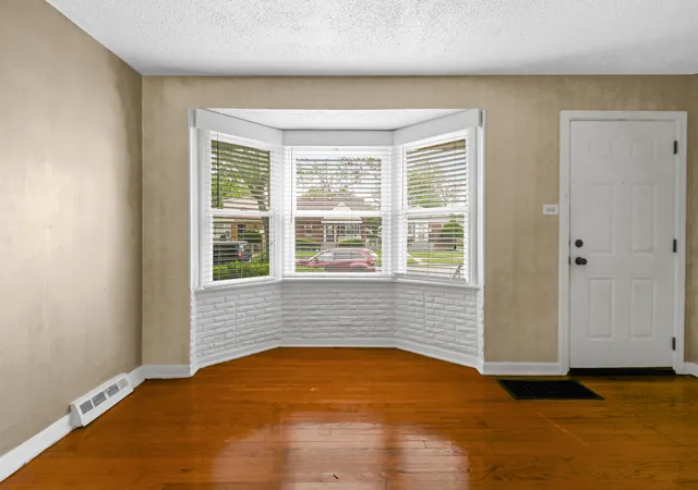 Photo 4 of Single family home for sale at 12755 S Parnell St, Chicago, IL 60628 | MLS# 12772976 | Listing updated on 2026-09-30