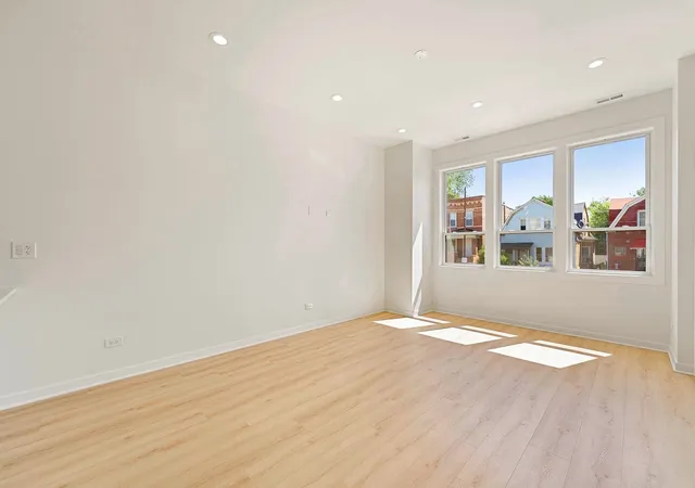 Photo 3 of Multi family home for sale at 542 N Lawndale Ave, Chicago, IL 60624 | MLS# 12773904 | Listing updated on 2026-10-04