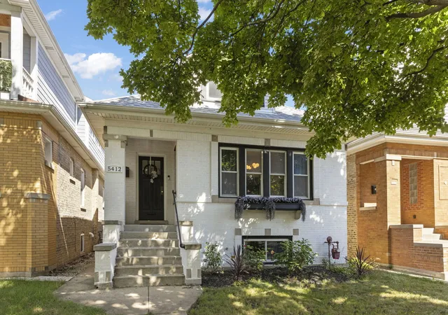 Single family home for sale at 5412 W Henderson St, Chicago, IL 60641 | MLS# 12773952