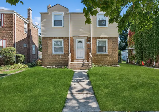 Single family home for sale at 10107 S Paxton Ave, Chicago, IL 60617 | MLS# 12773961