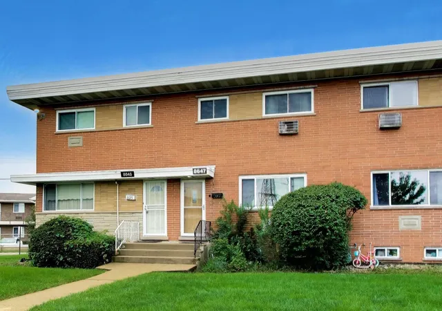 Photo 1 of Townhouse for sale at 8647 Gregory Ln, Des Plaines, IL 60016 | MLS# 12774091 | Listing updated on 2026-10-07