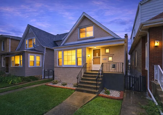 Single family home for sale at 6221 S Tripp Ave, Chicago, IL 60629 | MLS# 12774385