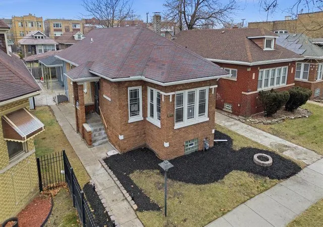 Single family home for sale at 7724 S Chappel Ave, Chicago, IL 60649 | MLS# 12774608