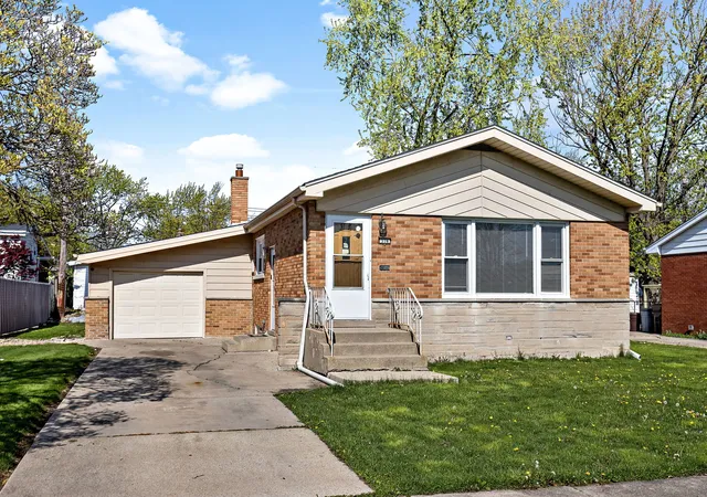 Photo 2 of Single family home for sale at 316 N Arquilla Dr, Chicago Heights, IL 60411 | MLS# 12775698 | Listing updated on 2026-10-07