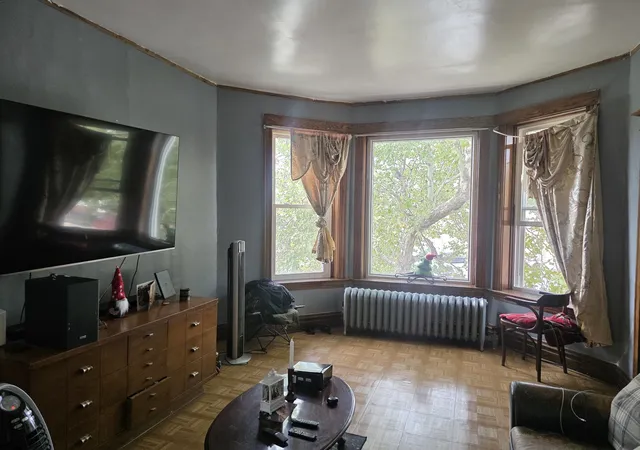 Photo 3 of Multi family home for sale at 1465 N Kedvale Ave, Chicago, IL 60651 | MLS# 12776406 | Listing updated on 2026-10-08