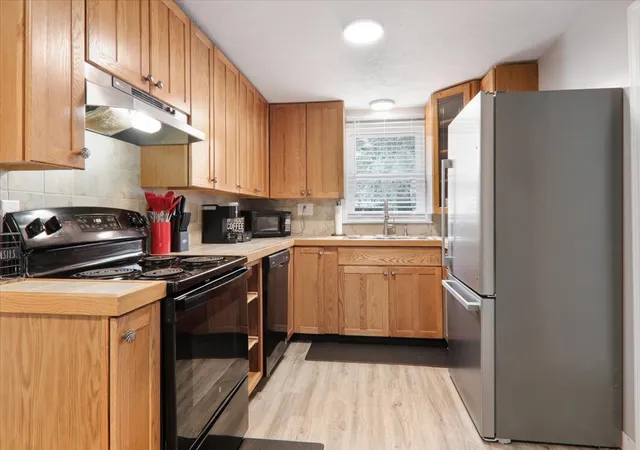 Photo 3 of Single family home for sale at 211 S Coolidge St, Normal, IL 61761 | MLS# 12776564 | Listing updated on 2026-10-06