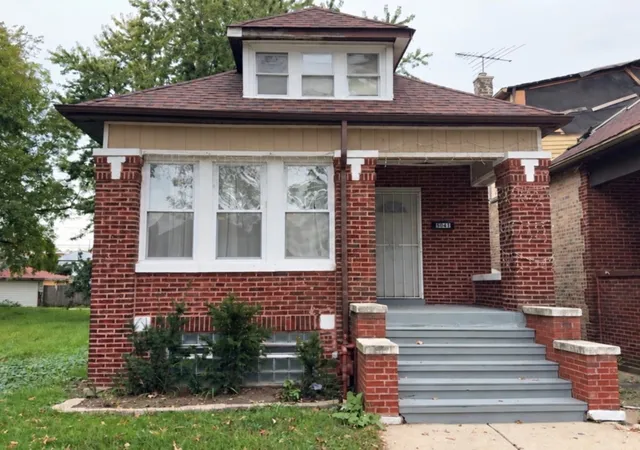 Photo 1 of Single family home for sale at 8041 S Escanaba Ave, Chicago, IL 60617 | MLS# 12776689 | Listing updated on 2026-10-11