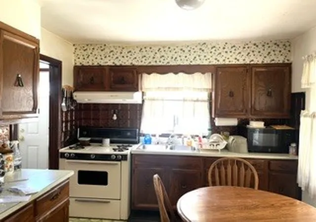 Photo 3 of Single family home for sale at 15435 Winchester Ave, Harvey, IL 60426 | MLS# 12776754 | Listing updated on 2026-10-07