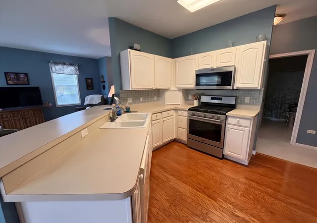 Photo 3 of Townhouse for sale at 16334 Crescent Lake Dr, Crest Hill, IL 60403 | MLS# 12776780 | Listing updated on 2026-10-07