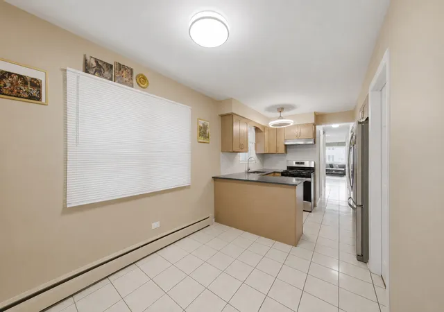 Photo 3 of Multi family home for sale at 5759 N Elston Ave, Chicago, IL 60646 | MLS# 12777301 | Listing updated on 2026-10-07