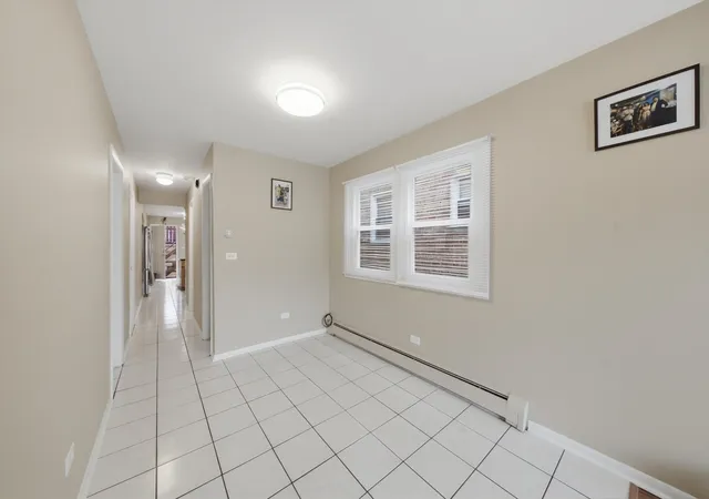 Photo 3 of Multi family home for sale at 5759 N Elston Ave, Chicago, IL 60646 | MLS# 12777301 | Listing updated on 2026-10-07