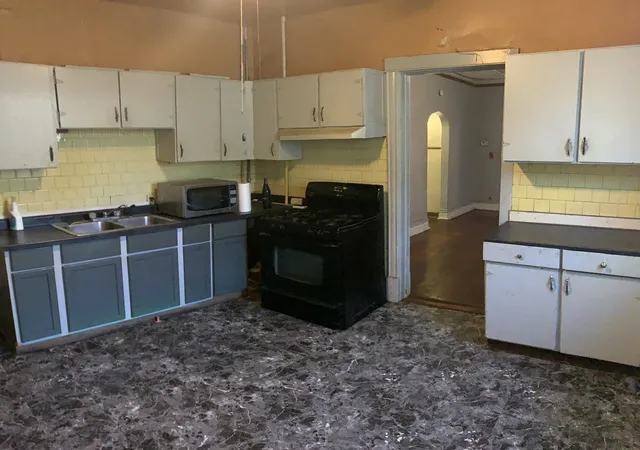 Photo 3 of Multi family home for sale at 9231 S Woodlawn Ave, Chicago, IL 60619 | MLS# 12777361 | Listing updated on 2026-10-06