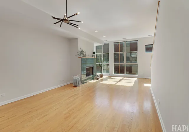 Photo 4 of Townhouse for sale at 6957 N Western Ave #E, Chicago, IL 60645 | MLS# 12777833 | Listing updated on 2026-10-08