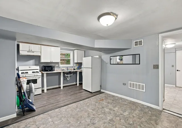 Photo 3 of Multi family home for sale at 2956 N Elston Ave, Chicago, IL 60618 | MLS# 12777977 | Listing updated on 2026-10-07