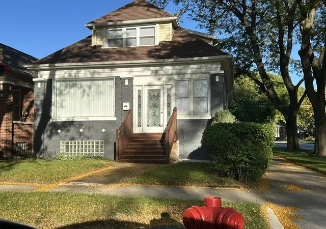 Photo 1 of Single family home for sale at 7659 S Bennett Ave, Chicago, IL 60649 | MLS# 12778645 | Listing updated on 2026-10-20