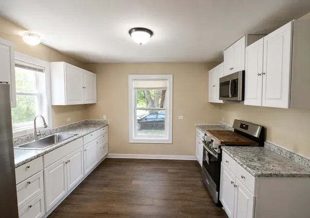 Photo 2 of Single family home for sale at 14632 Green St, Harvey, IL 60426 | MLS# 12778693 | Listing updated on 2026-10-07