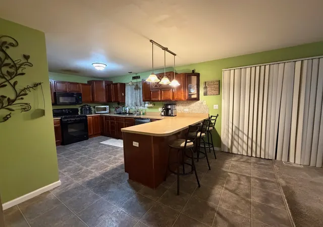 Photo 3 of Single family home for sale at 1917 Sunshine Ct, Zion, IL 60099 | MLS# 12778853 | Listing updated on 2026-10-23