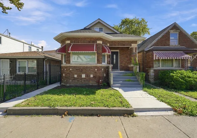 Single family home for sale at 10453 S Indiana Ave, Chicago, IL 60628 | MLS# 12778946