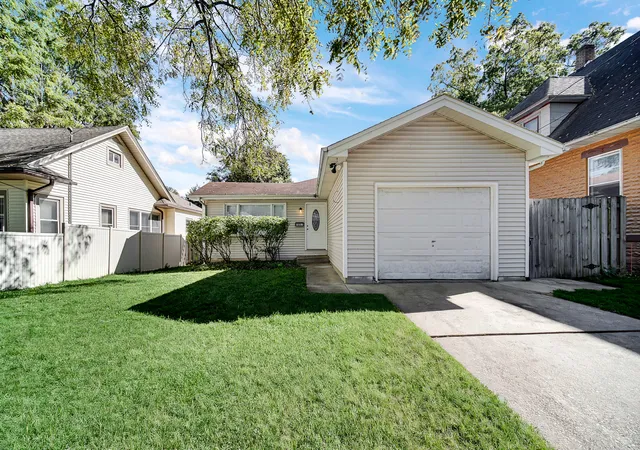 Single family home for sale at 1007 Cedar Ave, Elgin, IL 60120 | MLS# 12779430