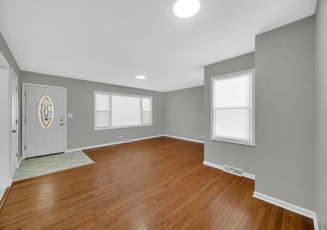 Photo 3 of Single family home for sale at 1007 Cedar Ave, Elgin, IL 60120 | MLS# 12779430 | Listing updated on 2026-10-07