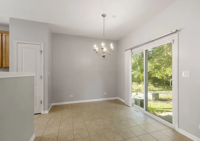 Photo 2 of Townhouse for sale at 1420 Yellowstone Dr, Streamwood, IL 60107 | MLS# 12780400 | Listing updated on 2026-10-08