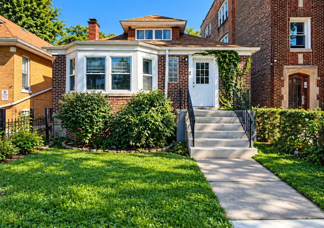 Photo 2 of Single family home for sale at 7735 S Colfax Ave, Chicago, IL 60649 | MLS# 12780539 | Listing updated on 2026-10-08