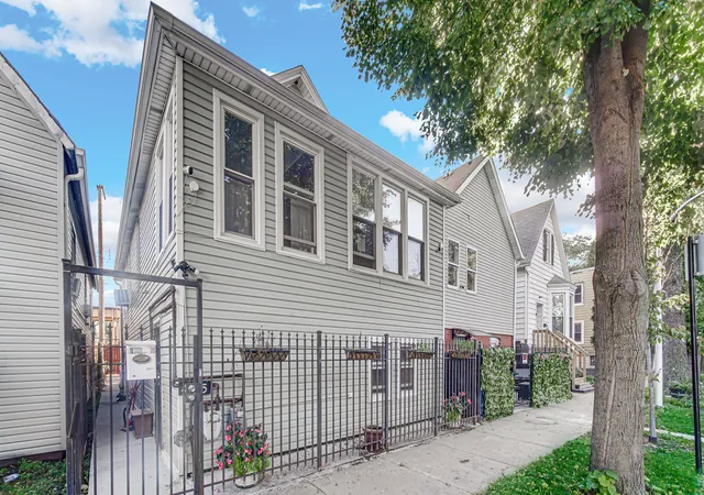 Photo 2 of Multi family home for sale at 4425 W Carroll Ave, Chicago, IL 60624 | MLS# 12780558 | Listing updated on 2026-10-09