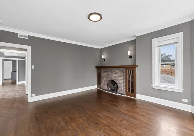 Photo 3 of Multi family home for sale at 8210 S Marshfield Ave, Chicago, IL 60620 | MLS# 12780649 | Listing updated on 2026-10-21