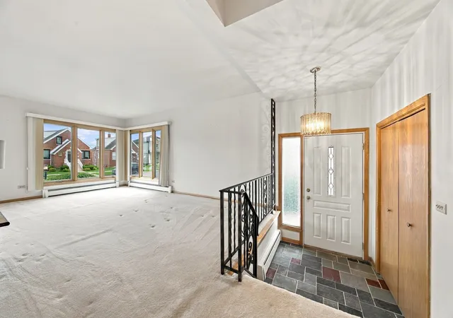 Photo 3 of Single family home for sale at 5708 S Newcastle Ave, Chicago, IL 60638 | MLS# 12781821 | Listing updated on 2026-10-22