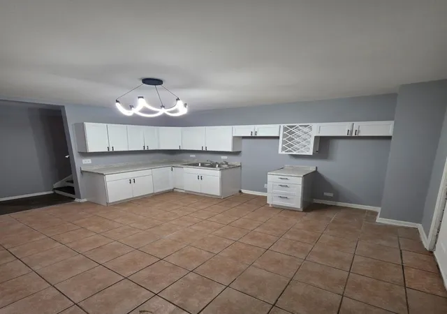 Photo 3 of Single family home for sale at 8013 S Marquette Ave, Chicago, IL 60617 | MLS# 12782056 | Listing updated on 2026-10-10