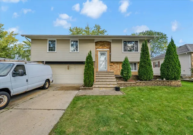 Single family home for sale at 916 Stowell Ave, Streamwood, IL 60107 | MLS# 12782424