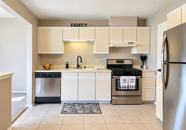 Photo 1 of Townhouse for sale at 1404 Nottingham Ct #C2, Wheeling, IL 60090 | MLS# 12782582 | Listing updated on 2026-10-21
