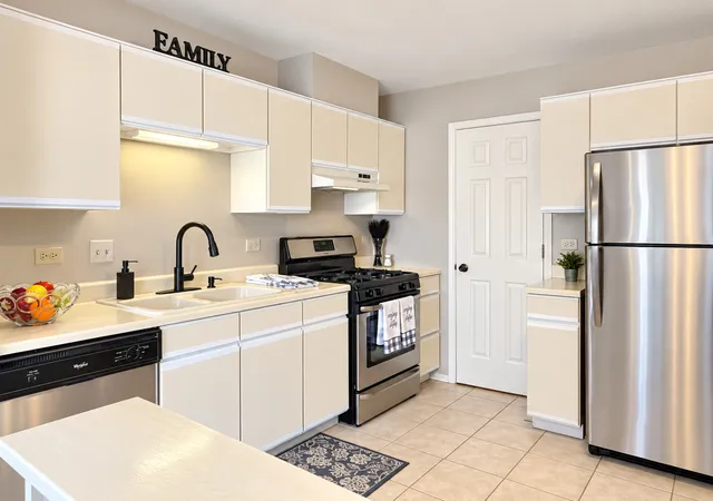Photo 2 of Townhouse for sale at 1404 Nottingham Ct #C2, Wheeling, IL 60090 | MLS# 12782582 | Listing updated on 2026-10-21