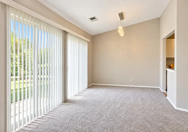Photo 3 of Townhouse for sale at 1404 Nottingham Ct #C2, Wheeling, IL 60090 | MLS# 12782582 | Listing updated on 2026-10-21