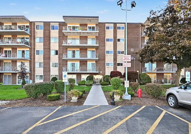 Photo 1 of Condo for sale at 2900 Maple Ave #20-E, Downers Grove, IL 60515 | MLS# 12783311 | Listing updated on 2026-10-27