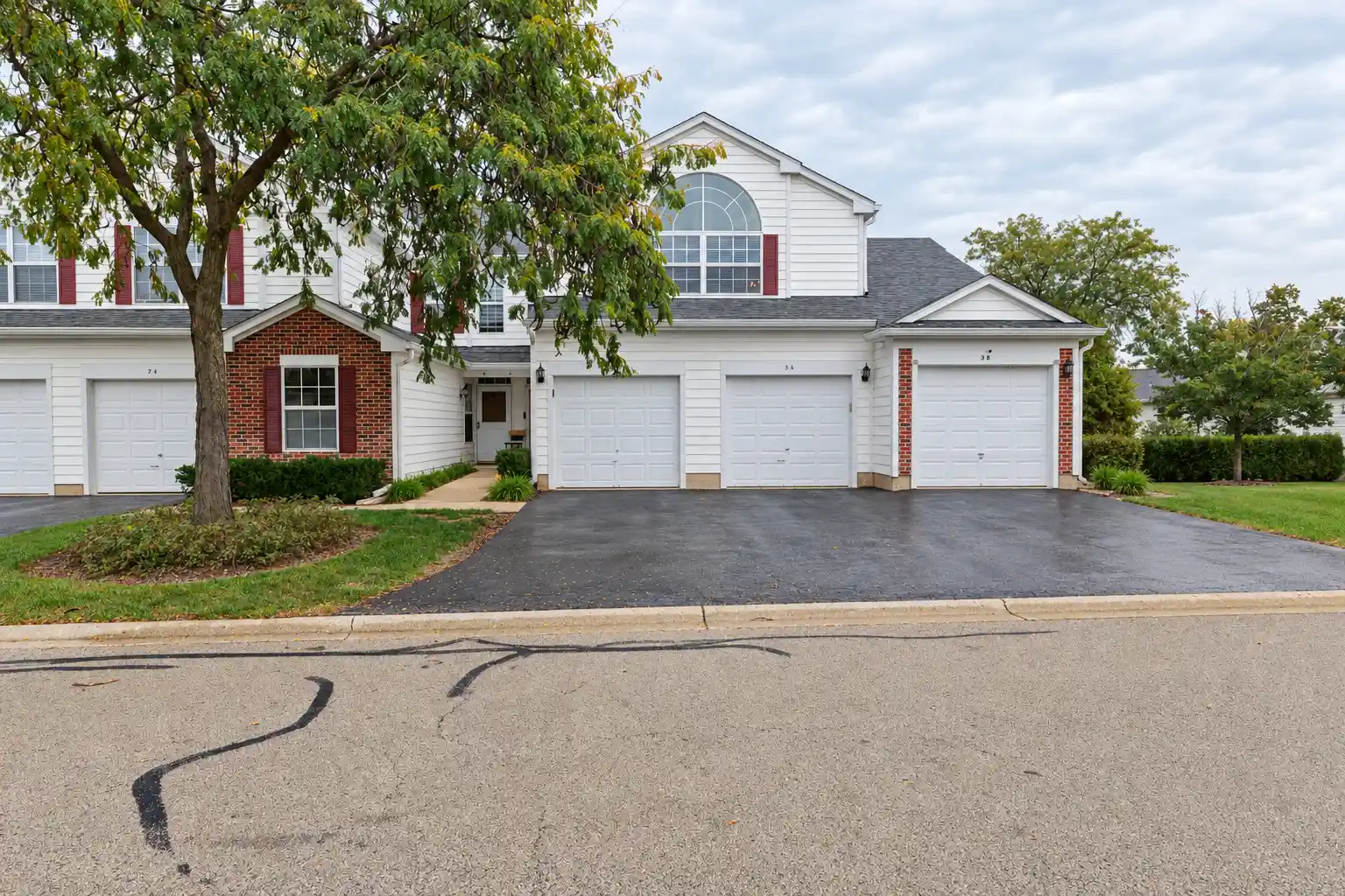 Listing Photo 1 - Condo for sale in 7 Hoover Ct located at 7 Hoover Ct, Streamwood, IL 60107 - Unit 7 Hoover Ct