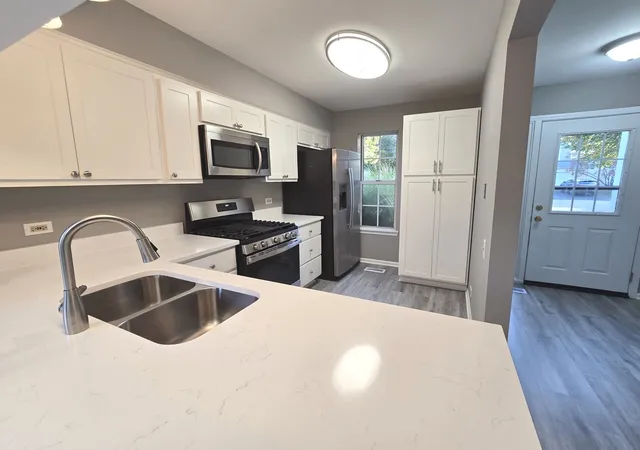 Photo 2 of Townhouse for sale at 1672 Pebble Beach Cir, Elgin, IL 60123 | MLS# 12784752 | Listing updated on 2026-10-21