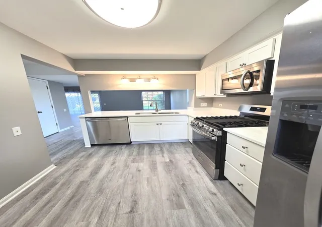 Photo 3 of Townhouse for sale at 1672 Pebble Beach Cir, Elgin, IL 60123 | MLS# 12784752 | Listing updated on 2026-10-21