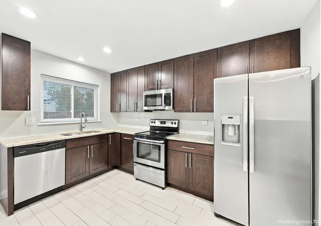 Photo 4 of Condo for sale at 400 E Kensington Rd #B, Mount Prospect, IL 60056 | MLS# 12785215 | Listing updated on 2026-10-21