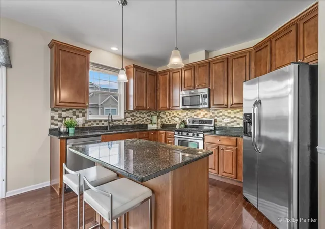 Photo 3 of Townhouse for sale at 1671 Maple Ave, Hanover Park, IL 60133 | MLS# 12785504 | Listing updated on 2026-10-22