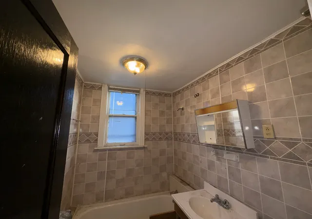 Photo 4 of Multi family home for sale at 7802 S Aberdeen St, Chicago, IL 60620 | MLS# 12785651 | Listing updated on 2026-10-22