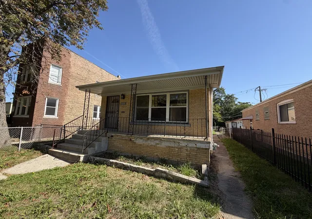 Single family home for sale at 10517 S Cottage Grv Ave, Chicago, IL 60628 | MLS# 12785912