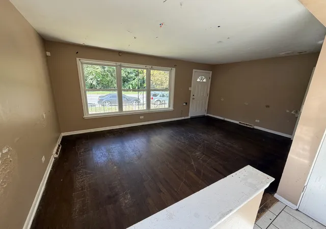 Photo 3 of Single family home for sale at 10517 S Cottage Grv Ave, Chicago, IL 60628 | MLS# 12785912 | Listing updated on 2026-10-20